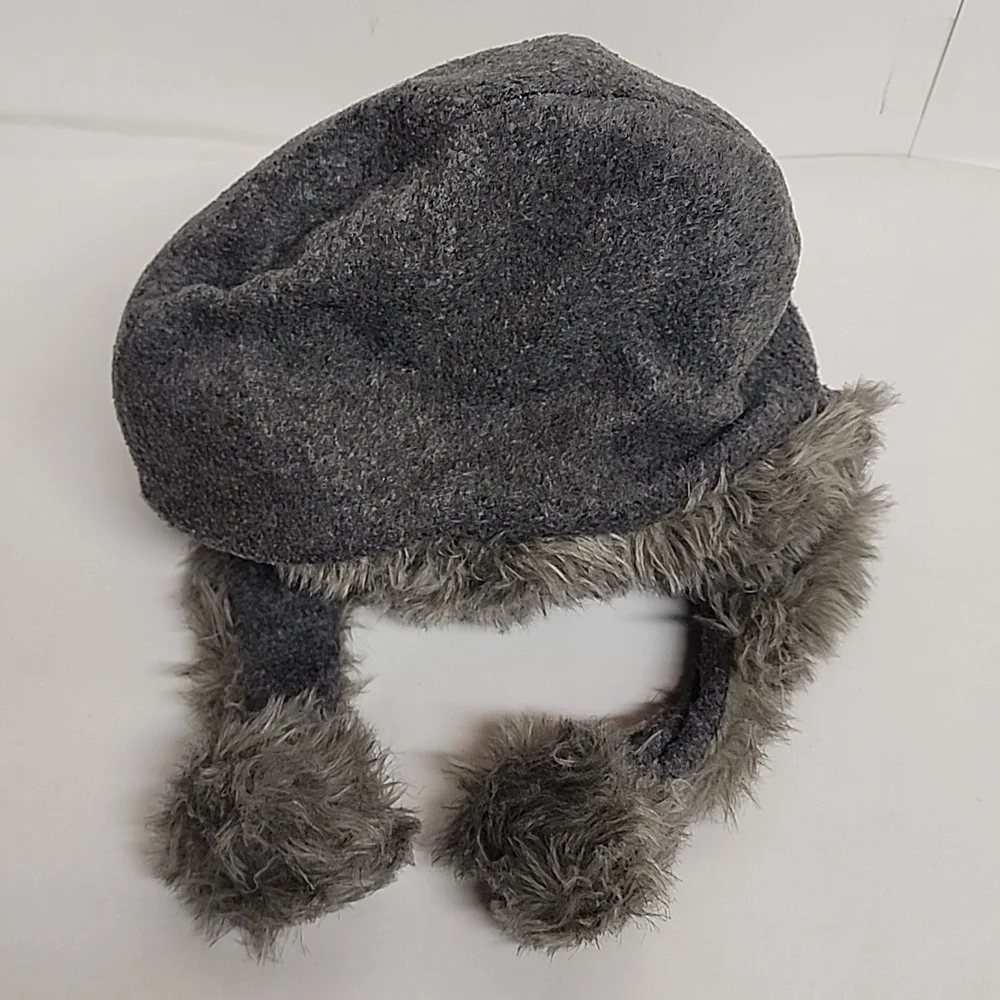 Plush Elephant Hat with Pink Ears, White Tusks, And Adorable Trunk.